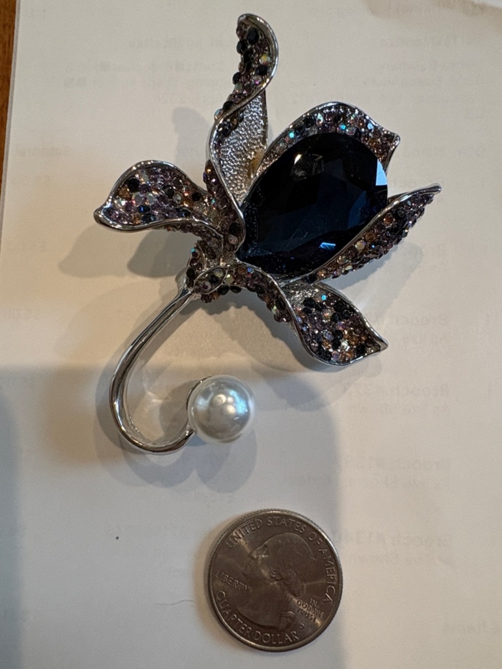 Crystal Flower Brooch with Dark Blue Stone and Pearl Accent